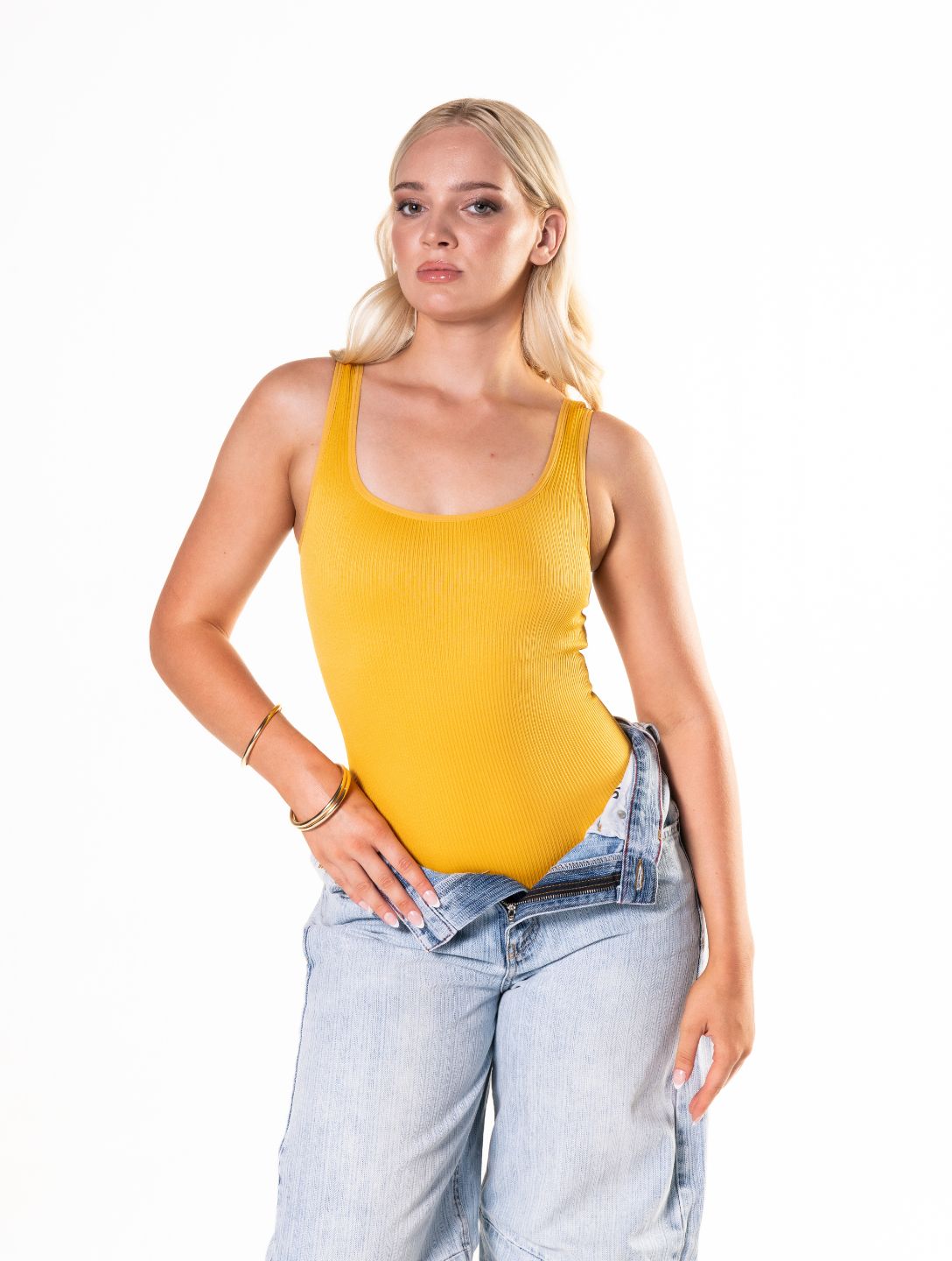Form-fitting, ribbed shapewear bodysuit