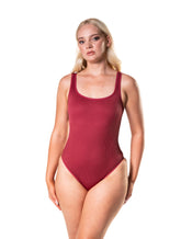 Form-fitting, ribbed shapewear bodysuit